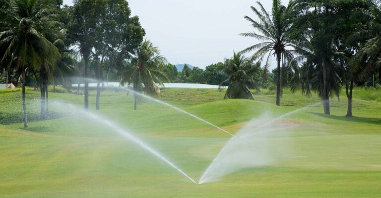 Why are my pop up sprinklers not retracting?